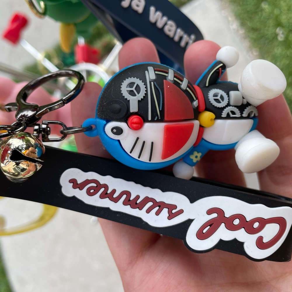 Blue and Black Stuffed Animal Toy with Cartoon Design